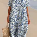 Magnolia - Ivory Dress Adorned with Porcelain Blue Floral Accents